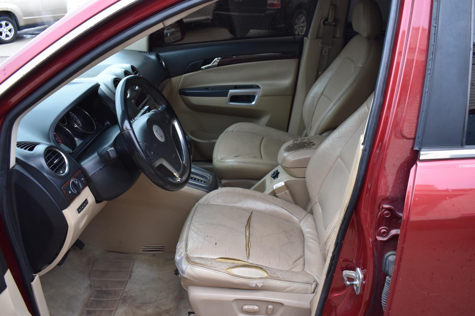 2009 Red /Tan Saturn VUE (3GSCL53P69S) with an L4, 2.4L engine, AUTOMATIC transmission, located at 5925 E. BELKNAP ST., HALTOM CITY, TX, 76117, (817) 834-4222, 32.803799, -97.259003 - Deciding whether to buy a specific car, like a 2009 Saturn VUE SUV, depends on various factors, including your preferences, needs, budget, and the condition of the specific vehicle you're considering. Here are some potential reasons you might consider when evaluating the 2009 Saturn VUE: Price: If - Photo#10